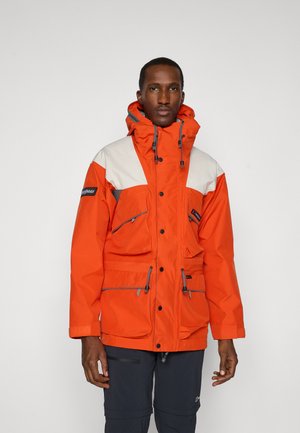 Bright orange waterproof jacket featuring a high collar, grey accents, multiple pockets, and adjustable drawstrings at the hood and hem.