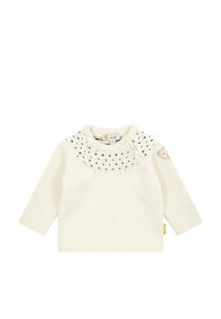 Maglione lavorato a maglia di colore crema con maniche lunghe, yoke decorato e un piccolo accento a forma di orso sulla manica. Presenta un collo rotondo e un'etichetta.