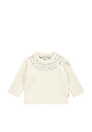 Maglione lavorato a maglia di colore crema con maniche lunghe, yoke decorato e un piccolo accento a forma di orso sulla manica. Presenta un collo rotondo e un'etichetta.