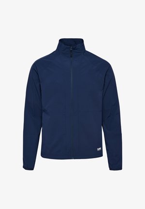 Marineblaue Windjacke mit hohem Kragen, durchgehendem Reißverschluss vorne und elastischen Bündchen. Verfügt über ein dezentes Logo in der Nähe des Saums und eine glatte Oberfläche.