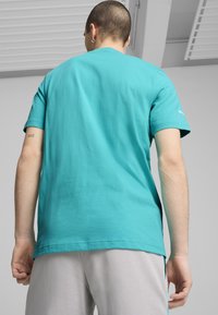 Puma - T-shirt z nadrukiem