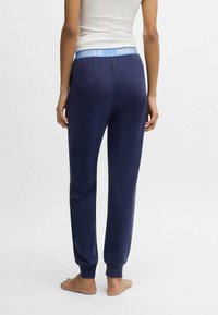 HUGO LOGO - Träningsbyxor - dark blue eighteen