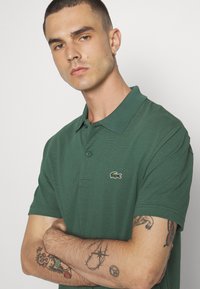 Lacoste Sport KURZARM - Polo - vert fonce