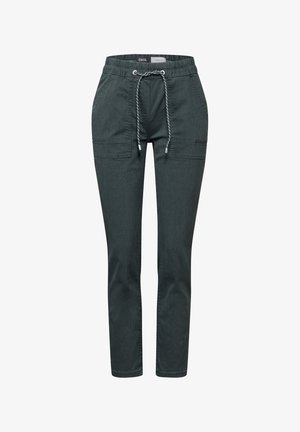 Dunkelgrüne Freizeitpants aus weichem Stoff. Mit elastischem Bund und Kordelzug, zwei vorderen Taschen und einem schmal zulaufenden Bein.