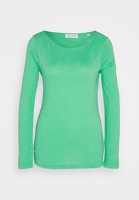 Maglietta a maniche lunghe di un vivace verde, realizzata in tessuto leggero con una superficie liscia. Presenta un collo rotondo e una vestibilità comoda.