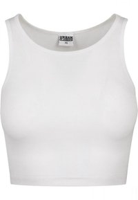 Biely bavlnený crop top s rebrovou textúrou. Má okrúhly výstrih a široké ramienka. Na štítku je nápis "URBAN CLASSICS" s veľkosťou XS.