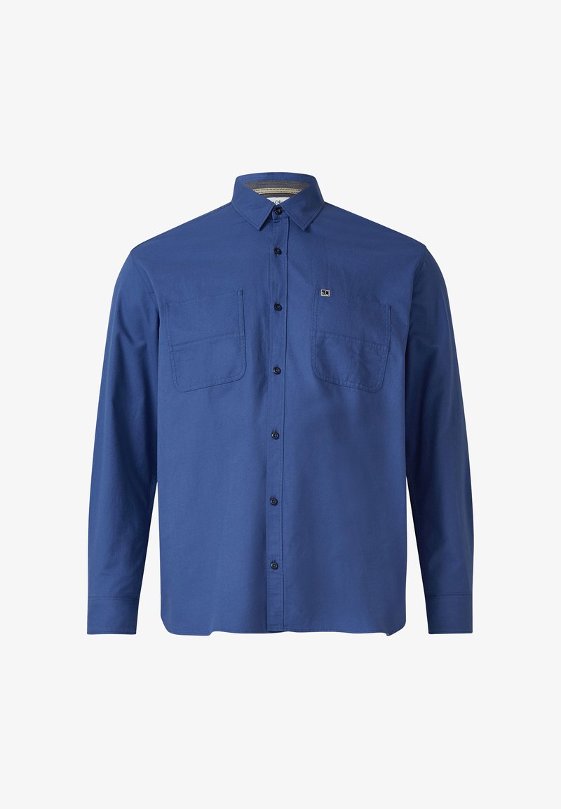 Chemise boutonnière bleu à manches longues en coton. Présente deux poches poitrine, des boutons noirs et un col décontracté. Texture lisse.