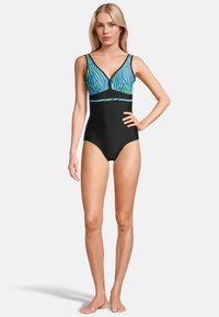 Maillot de bain une pièce noir avec un motif rayé bleu et vert en haut, présentant un décolleté en V et de larges bretelles.