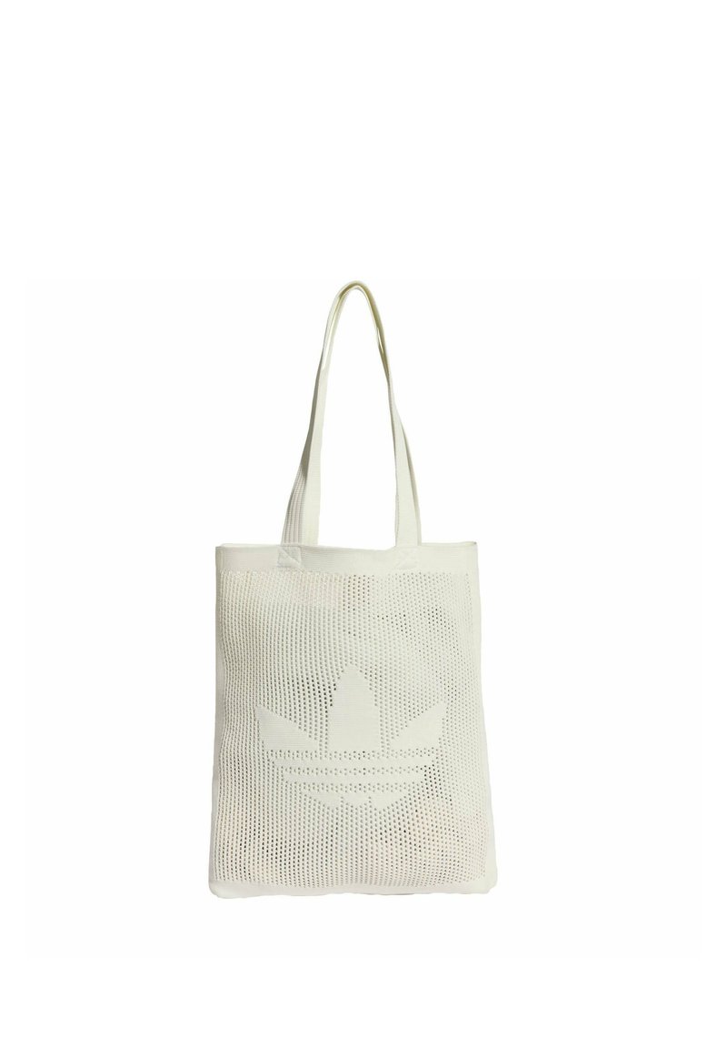 Bijela mrežasta torba za nošenje s dva mekana drška, s istaknutim perforiranim logom na prednjoj strani. Lagana i fleksibilna tekstura.