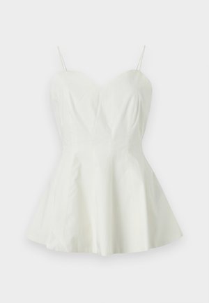 Λευκό αμάνικο φόρεμα με λεπτές τιράντες και εφαρμοστό μπούστο που ανοίγει σε μια κοντή φούστα σε σχήμα Α.