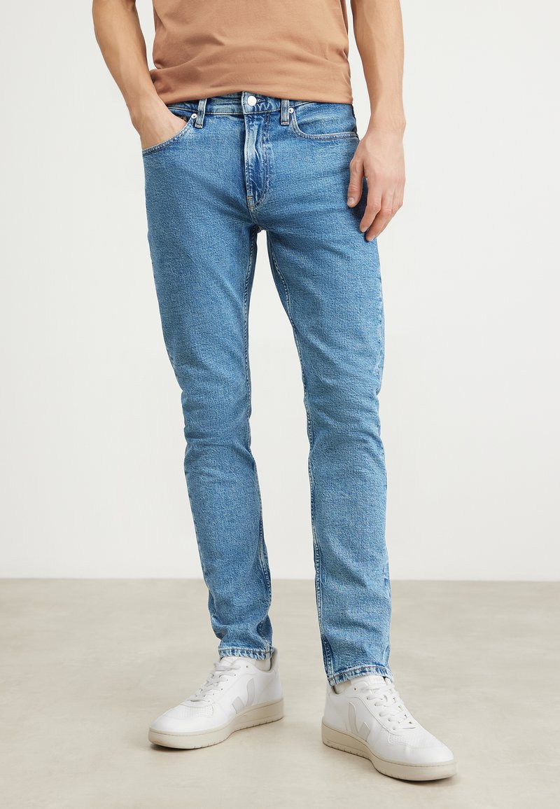 Calvin Klein Jeans SLIM TAPER Slim fit jeans denim light/lightblue