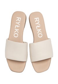 Sandali in beige con una ampia fascetta superiore liscia e una suola piatta. Nome del marchio "RYŁKO" stampato in bianco sulla soletta.