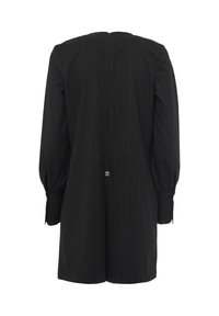 Blazer lungo a righe nere con maniche lunghe, spalle strutturate, polsini con bottoni e chiusura con zip sul retro.