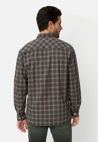 Men's long-sleeve shirt in a gray, blue, and orange plaid pattern, featuring a standard collar and button cuffs, made from cotton fabric.