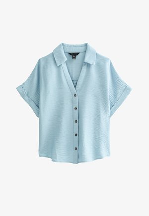 Chemise bleu clair à manches courtes avec boutons, col et poignets retroussés, fabriquée en tissu texturé.