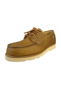 Scarpe stringate in pelle marrone con punta arrotondata, suola color cuoio e dettagli di cucitura lungo le cuciture. Presenta un piccolo etichetta con logo sul lato.