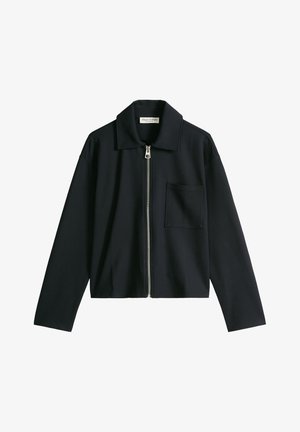 Black long-sleeve jacket with front zipper, collar, and single chest pocket, laid flat on a white background.