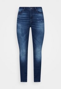 Slim fit jeans i mörkblå denim med en lätt blekning, fem fickor, knappstängning fram och kontrasterande sömmar. Klassisk avsmalnande design.