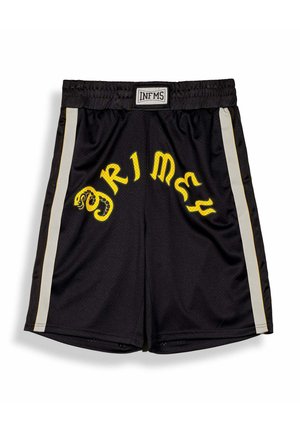 Pantalones cortos deportivos negros con rayas laterales blancas, texto estilizado "PRIMELY" en amarillo y un gráfico de serpiente en la parte delantera, cintura elástica con etiqueta "INFMS".