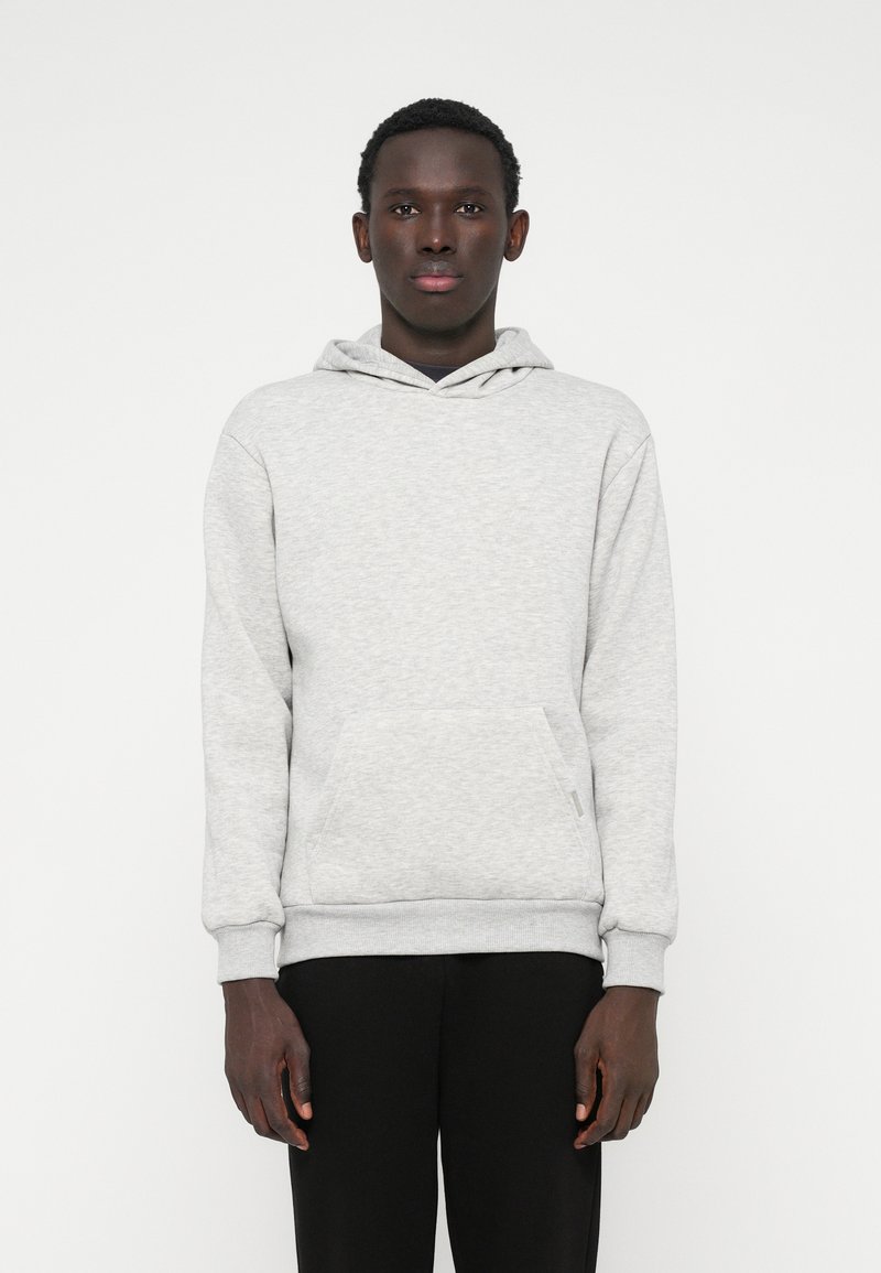 Gray sweatshirt with a hood and front pocket, featuring a soft texture and ribbed cuffs at the wrists and hem.