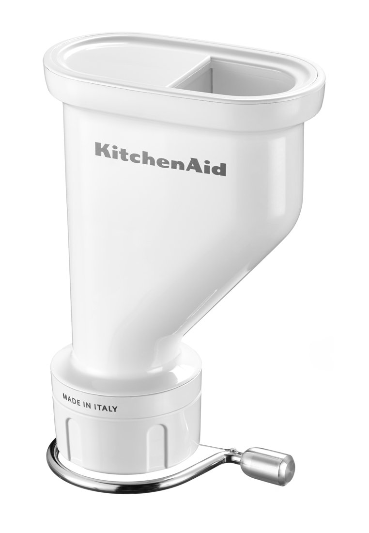 Przypinka do malaksera KitchenAid w błyszczącym białym plastiku z otworem dwukomorowym, metalowymi elementami i okrągłą podstawą oznaczoną "Wyprodukowano we Włoszech".