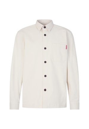 Camicia button-up avorio in cotone, caratterizzata da una tasca applicata, bottoni rotondi scuri e un colletto classico.