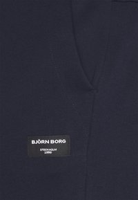 Björn Borg CENTRE TAPERED PANTS - Treniņtērpa apakšdaļas - night sky