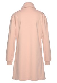 Langärmlige Tunika aus weichem Stoff in zartem Rosa mit hohem Kragen und überschnittenen Schultern, gerader Schnitt und gerippten Bündchen.
