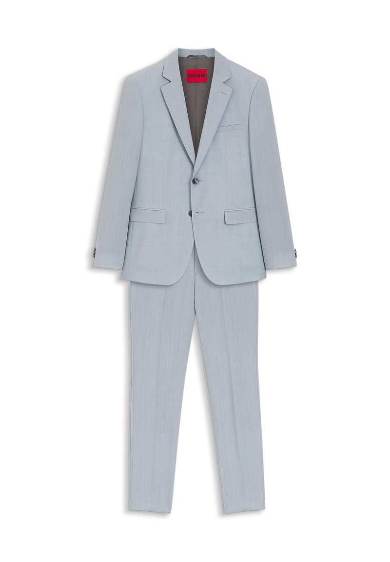 Traje