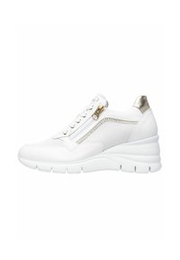 White sneaker with a mesh upper, wedge sole, metallic accents, and zipper detail on the side. Features a lace closure and textured materials.