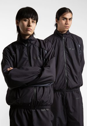 UNISEX SPINE TRACK - Veste de survêtement - black