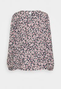 Blouse à manches longues avec fond noir et fleurs blanches aux centres rouges, décolleté en keyhole et poignets élastiques.