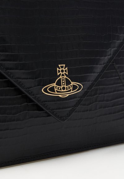 Black crocodile-textured clutch with a gold logo featuring a crown and orbit design. Features a flap closure and contrasting stitching.
