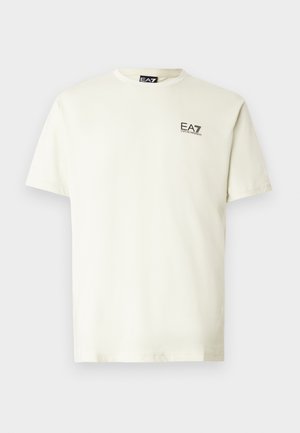 Hellbeiges T-Shirt mit kurzen Ärmeln aus Baumwolle. Verfügt über ein kleines schwarzes EA7-Logo auf der Brust. Klassischer Rundhalsausschnitt.