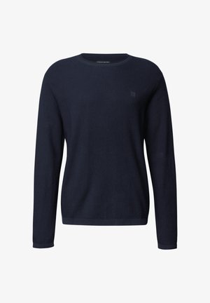 Pull marin, à manches longues, avec un motif en côtes texturé. Il présente un col rond et un petit logo sur la poitrine gauche.