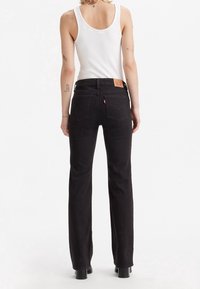 Levi's® Bootcut jeans - black denim