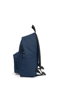 Navy blue backpack with front pocket, multiple black zipper pulls, and padded shoulder straps shown from the side on a white background.
