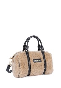 Faux fur handbag in beige with black leather accents, dual handles, and detachable shoulder strap. Features gold hardware and logo plaque.