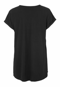 Zwarte katoenen t-shirt met een relaxte pasvorm, ronde halslijn en opgerolde mouwen. Eenvoudige achterkant met zijslits, gladde textuur.