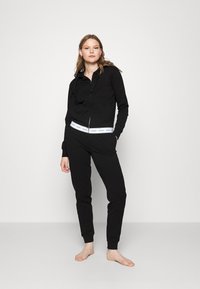 Guess JOGGER PANT - Pyjamasbukse - black