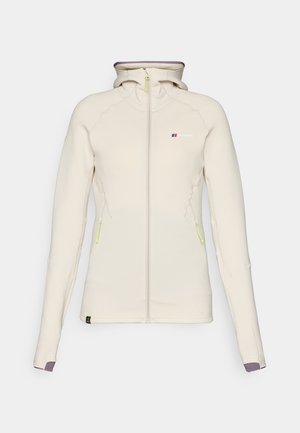 Lys kremfarget fleecejakke med et slim fit-design, hette, glidelås foran og grønne detaljer. Har side lommer og kontrasterende ermekanter.