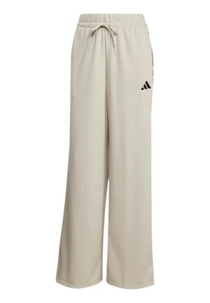Pantaloni beige a gamba larga in felpa con vita elastica, coulisse e logo Adidas nero sulla coscia destra.