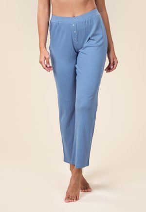 Hellblaue, gerippte Schlafanzughosen mit lockerer Passform, ausgestattet mit einem breiten, elastischen Bund und einer dreiknöpfigen Knopfleiste auf der Vorderseite.