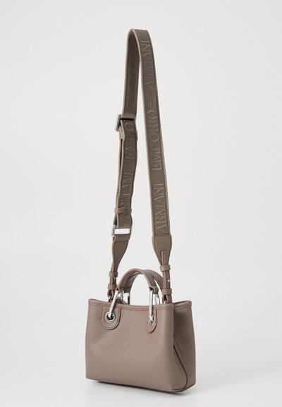 Grey leather handbag with a structured shape, featuring silver hardware and a removable, branded fabric strap. Textured surface and dual handles.