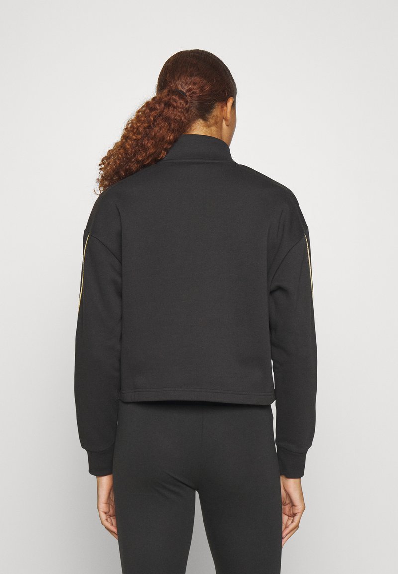 Puma ESS+ MINIMAL HALF ZIP MOCK NECK - Sweatshirt - black/noir - ZALANDO.FR