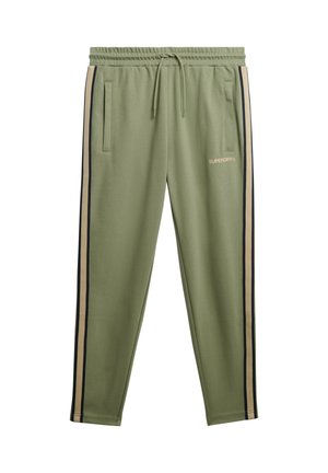 Groene joggers van zacht materiaal, met zijzakken, elastische tailleband met trekkoord en contrasterende strepen in beige en marineblauw.