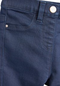 Next Traperice uskog kroja - light blue