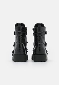 Guess Botines camperos - black