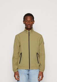 Calvin Klein CRINKLE BLOUSON - Lichte jas - delta green