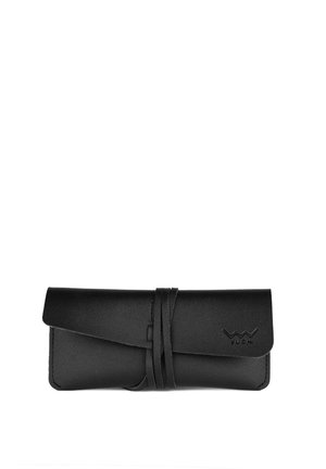 Black leather wallet with a flap closure, featuring a wrapped design and embossed logo. Smooth texture and minimalist style.